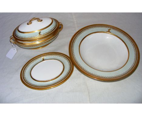 Minton, a fine porcelain soup tureen, stand and soup bowl, each piece beautifully gilded with various decoration and Greek ke