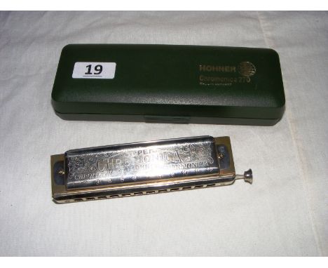  A Hohner, 270 Super Chromonica, harmonica in original box.