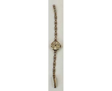 SLAVA; a lady's vintage 9ct yellow gold wristwatch, total approx 10.8g.