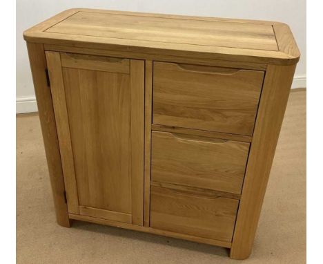 OAK FURNITURE LAND; a solid light oak Ramsey storage cabinet with three drawers beside one cupboard, 87 x 90 x 44cm.