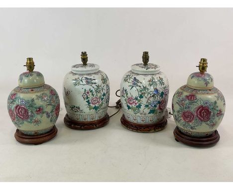 Two pairs of Chinese ceramic lamp bases mounted on wooden bases, largest height 29cm (4).Condition Report: The two smaller gr