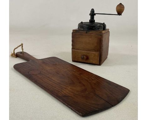 An early 20th century wooden coffee grinder with metal winder and mechanism, height 19cm, and a French pine chopping/bread bo