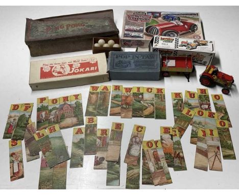 A collection of vintage games and puzzles, to include a J Jaques and Son Ltd and Hamley Bros ping pong game, boxed, with a mo