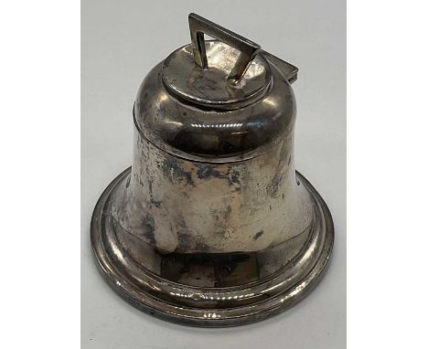 A George IV hallmarked silver inkwell in the form of a bell, with hinged lid, glass liner and loaded base, hallmarks obscured