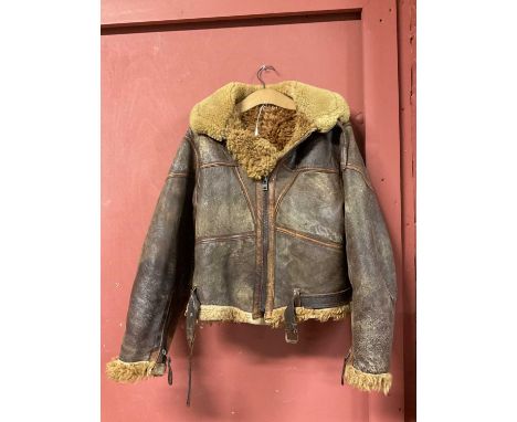 A vintage sheepskin flying jacket. Proceeds to be donated to Crisis for ChristmasCondition Report: Jacket sized deemed to be 