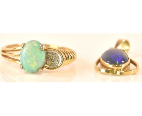 A 14ct yellow gold opal and diamond ring, size Q, and a black opal 14ct yellow gold pendant, combined approx 4.6g (2).