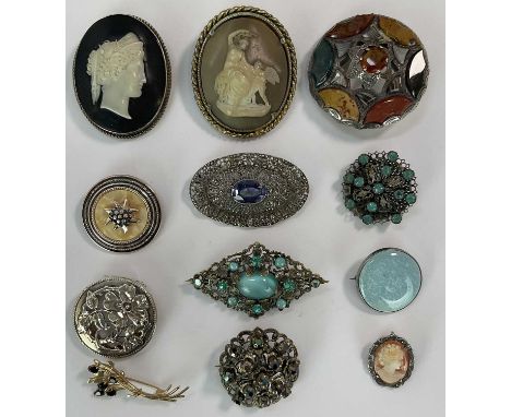 A group of vintage brooches including a 9ct yellow gold floral spray example, approx 3.1g, a large Scottish circular hardston
