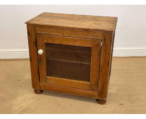A pine meat safe with metal mesh panels to the front and sides, ceramic handle and a single shelf, height 67cm, width 69cm, d