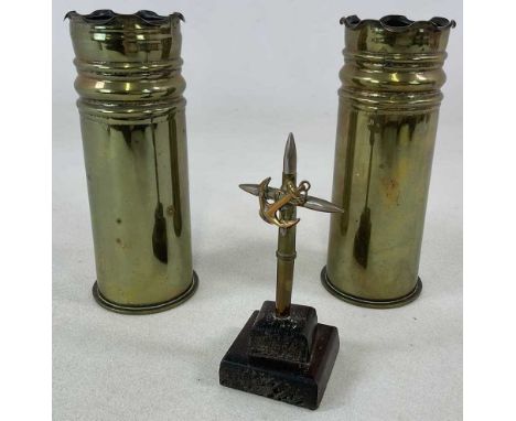 A pair of German trench art artillery shells, height 23cm, diameter 8cm, made into decorative vases, together with a crucifix