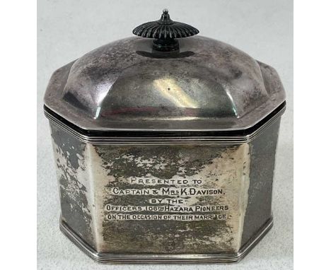 THOMAS BRADBURY &amp; SONS; a George V hallmarked silver tea caddy of octagonal form, inscribed 'Presented to Captain and Mrs