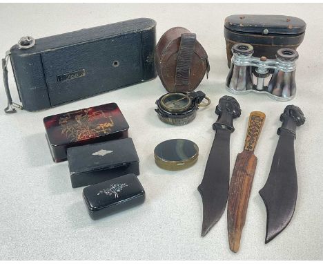 A group of collectors' items comprising a pigskin leather cased WWII pocket compass, lacquered snuff boxes, pair of opera gla