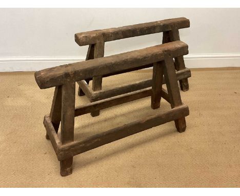 A pair of handbuilt wooden trestles, height 48cm, width 72cm, depth 28cm.Condition Report: Work bench