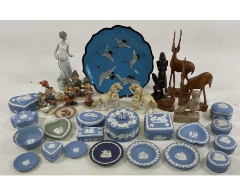 A collection of decorative ceramics, including Wedgwood jasperware, Goebel figures, Lladro, a cloisonné plate and other items