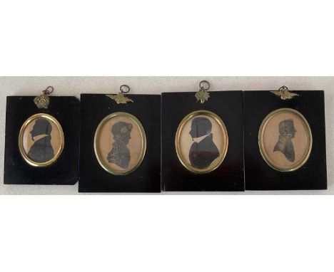 A set of four early 19th century silhouette portrait miniatures, each inscribed verso and in ebonised slip frames with gilt h