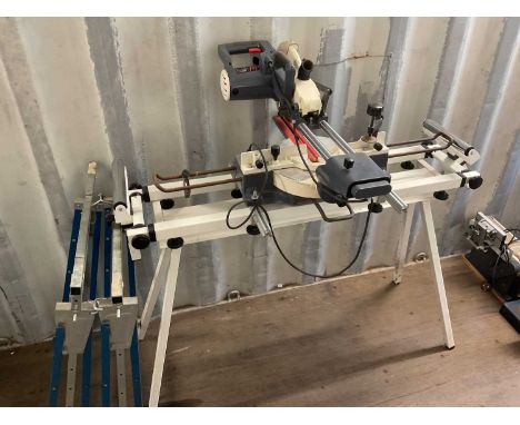 AXMINSTER; a 250mm slide mitre saw, together with two portable trestles.