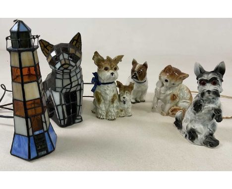 A collection of vintage lamps styled as cats and dogs, also with two stained glass lamps of a cat and a lighthouse, height 28