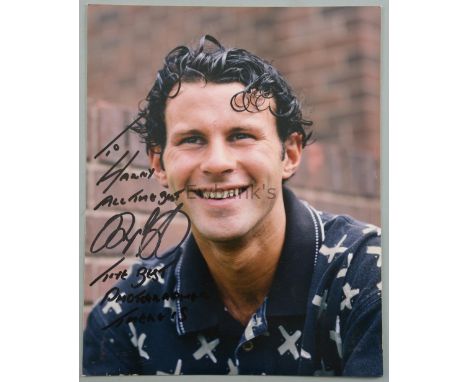 Ryan Giggs, a signed colour photograph of the former Manchester United footballer, by Harry Goodwin, stamped on reverse, 25 x