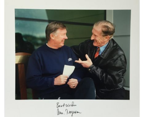 Signed photograph of Sir Alex Ferguson, showing Harry Goodwin &amp; Sir Alex Ferguson, mounted, 25 x 31 cm.Provenance: Collec