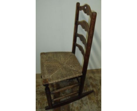 19th C elm ladder back rocking chair with rush seat 