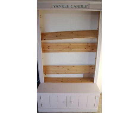 Painted pine Yankee Candle shop display stand with three their open adjustable shelf unit above base unit enclosed by two cup