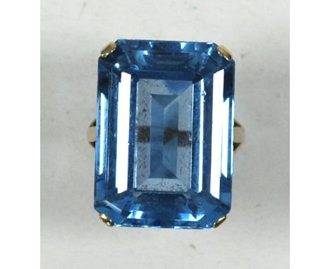 9ct GOLD DRESS RING, set with a large oblong pale blue zircon, 10gms gross, ring size L/M