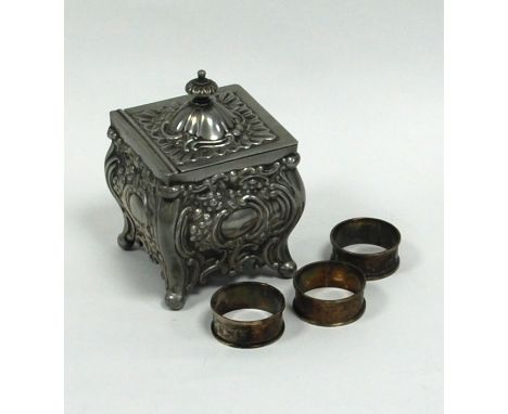 BOXED SET OF THREE EDWARD VII ENGRAVED SILVER NAPKIN RINGS, decorated with foliate scrolls, Chester 1909, 1oz approx, TOGETHE