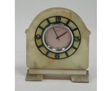 LE COULTRE, SWISS WHITE ONYX ART DECO MANTEL CLOCK, milestone shaped with green metal applied skeletal chapter ring with inne