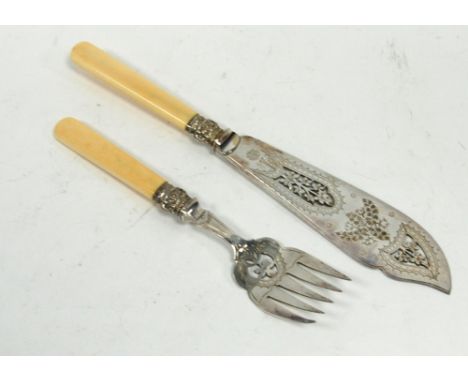 PAIR OF LATE VICTORIAN ELECTROPLATED FISH SERVERS with finely foliate pierced and bright cut engraved blades, embossed ferrul