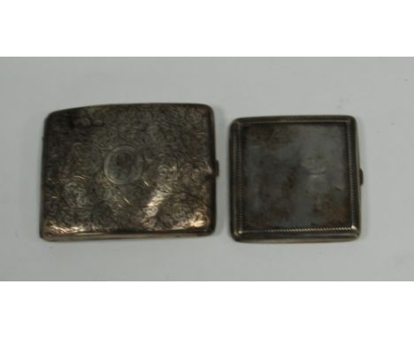 A PAIR OF VICTORIAN SILVER POCKET CIGARETTE CAKE curved oblong and engine turned allover foliate scroll engraved 4 1/4" wide,