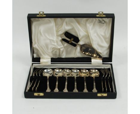 SILVER DESSERT SERVICE OF THIRTEEN PIECES, the handles having an embossed Celtic design with disc shaped tops, comprising a t