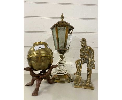 Mixed Lot: A heavy brass model of a miner together with a Lipton brass tea caddy and a small brass table lamp (3)