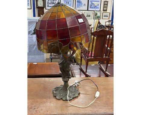 Figural table lamp with leaded glass shade