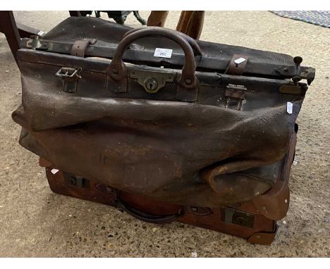 Large vintage Gladstone style leather bag and a further suitcase
