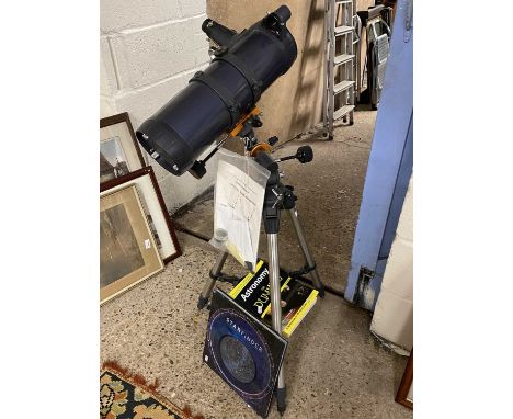 Celestron Astromaster Series telescope Model No 114 with tripod and related books