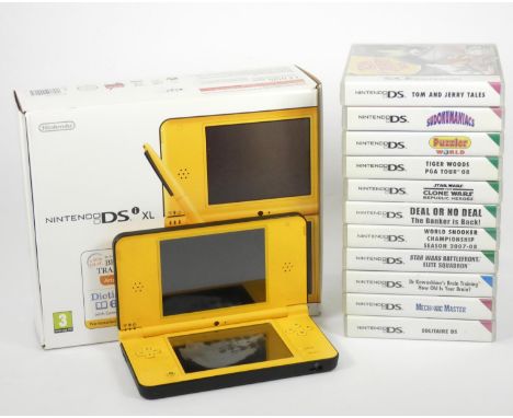 A Nintendo DSi XL, original box, charger, stylus, guides and manuals (missing large stylus), together with eleven cased games