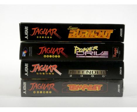 Four boxed Atari Jaguar games, to include Tempest 2000 (Factory sealed), Defender 2000 (manual and card insert), Power Drive 