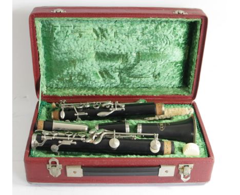 A Corton clarinet, made in Czechoslovakia, with brush and reed, fitted interior carry case