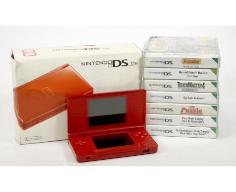 A Nintendo DS Lite console, red, with charger, stylus, manuals and original box, together with Brain Training, cased, with ma