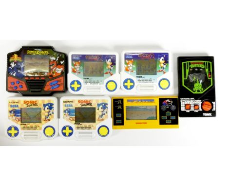 Six electronic handheld games, to include Tiger Sonic The Hedgehog x 2, Tiger Sonic The Hedgehog 2 x 2, Tiger Barcodzz Power 