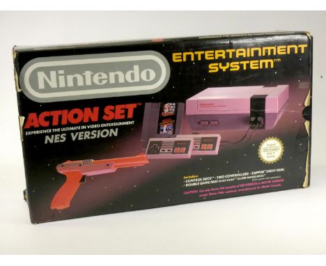 A Nintendo NES Action Set (model No NESE-001, original box, polystyrene insert, AV and power cables two Nintendo controllers,