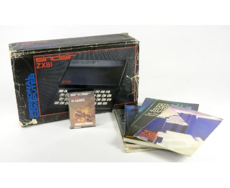 A Sinclair ZX81 personal computer, original box, Sinclair branded polystyrene insert, AV and power cables, Memopak expansion 