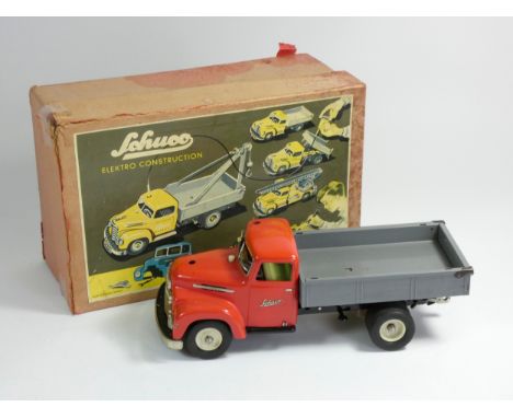 Schuco Model remote control truck, Kipper 6065, with steering wheel, battery compartment, tools and hardware, original box wi