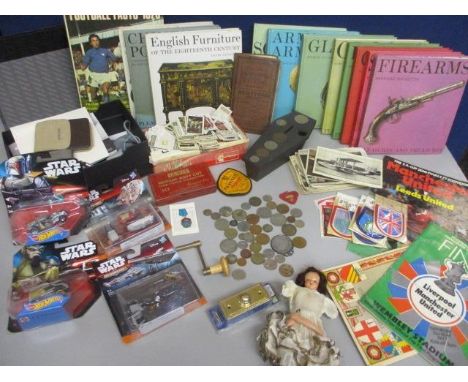 A quantity of mixed coins, cigarette cards, cloth badges, football programmes, books and other items to include modern Star W