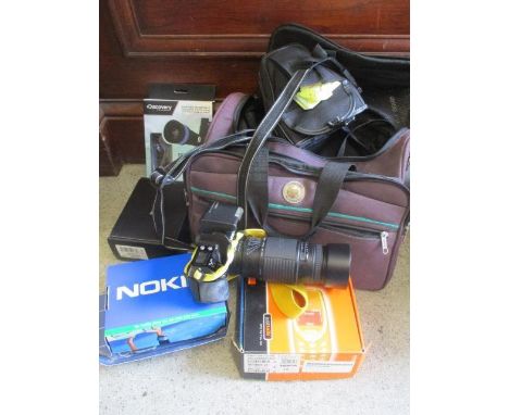 A mixed lot to include a Minolta camera, mixed phones and other items 