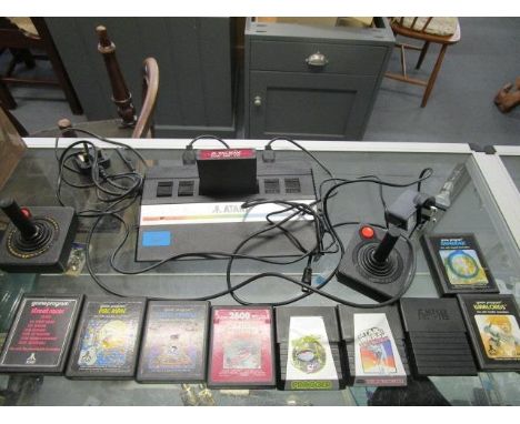 An Atari 2600 console with approximately ten games (un tested) 
