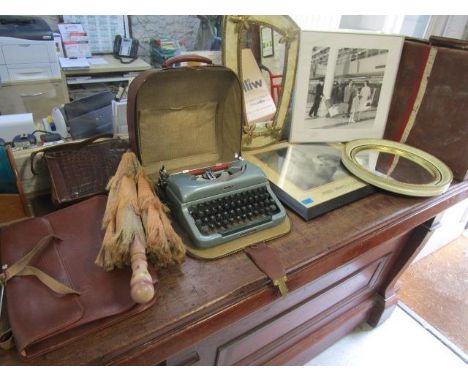 A mixed lot to include an Imperial Good Companion 4 cased typewriter, a leather suitcase with fitted interior, a convex wall 