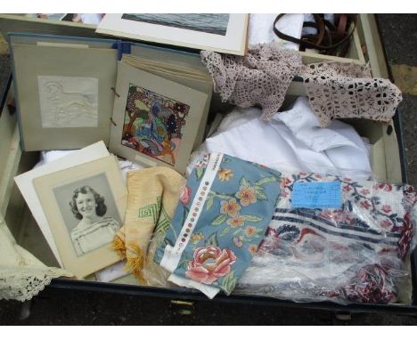 A travelling trunk and contents to include a haberdashery book of examples, linen and lace and others 