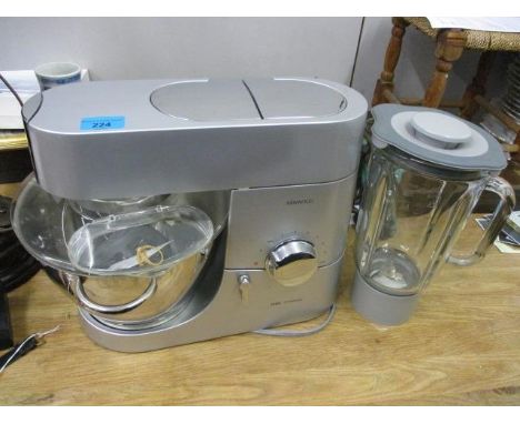 A Kenwood Chef Titanium food processor, model KM010 with attachments 