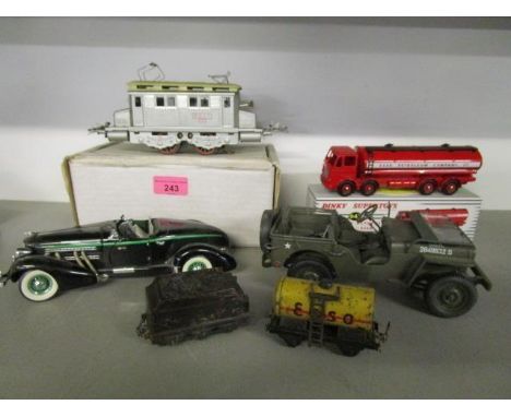 A selection of diecast model vehicles and other toys to include a boxed Atlas edition Dinky Supertoys Leyland Esso Octopus Ta