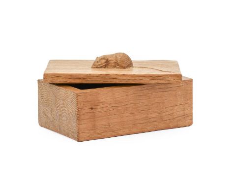 Workshop of Robert Mouseman Thompson (Kilburn): An English Oak Trinket Box and Cover, of rectangular form, the cover with car
